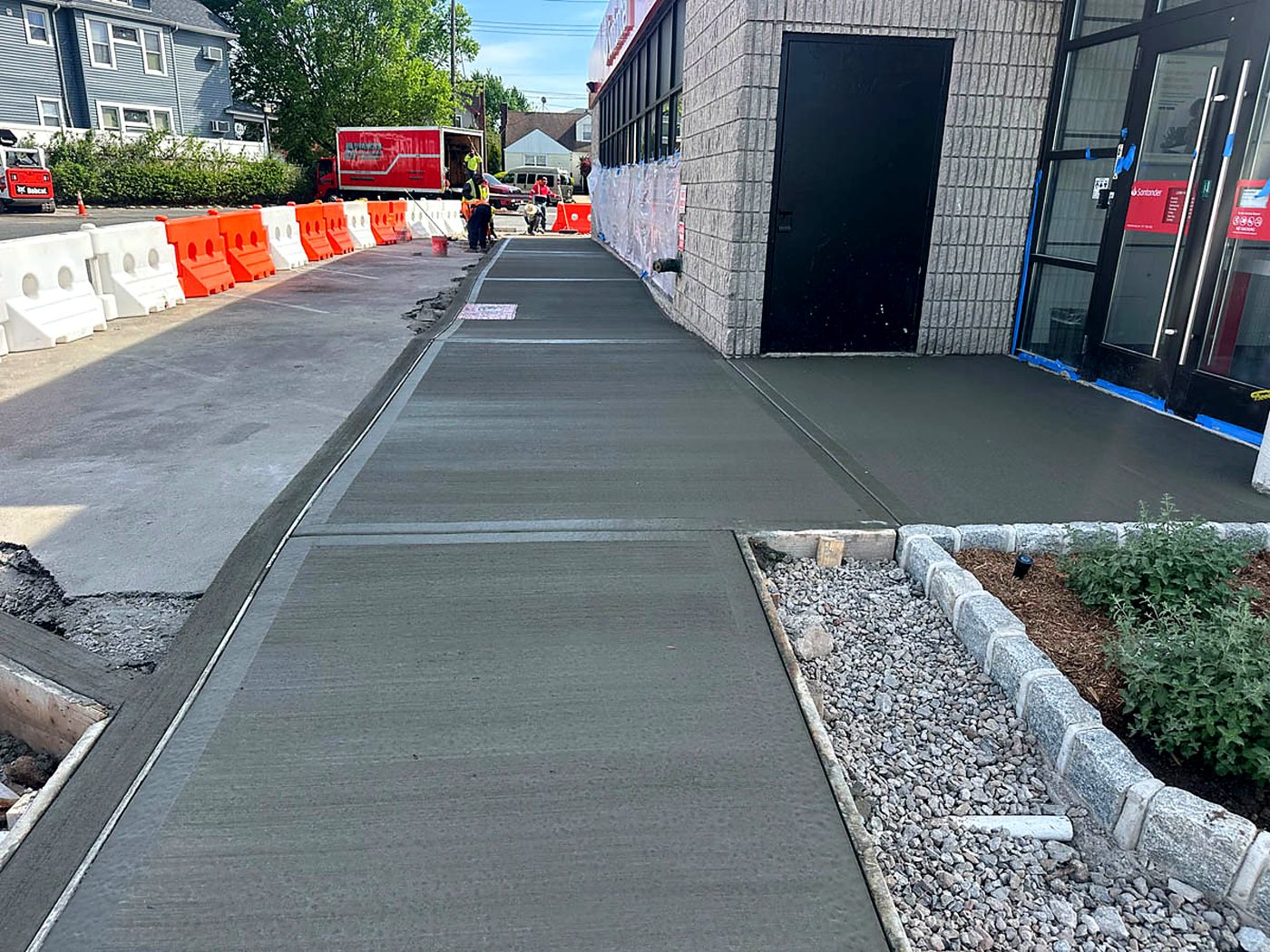 A finished accessible ramp at a building entrance
