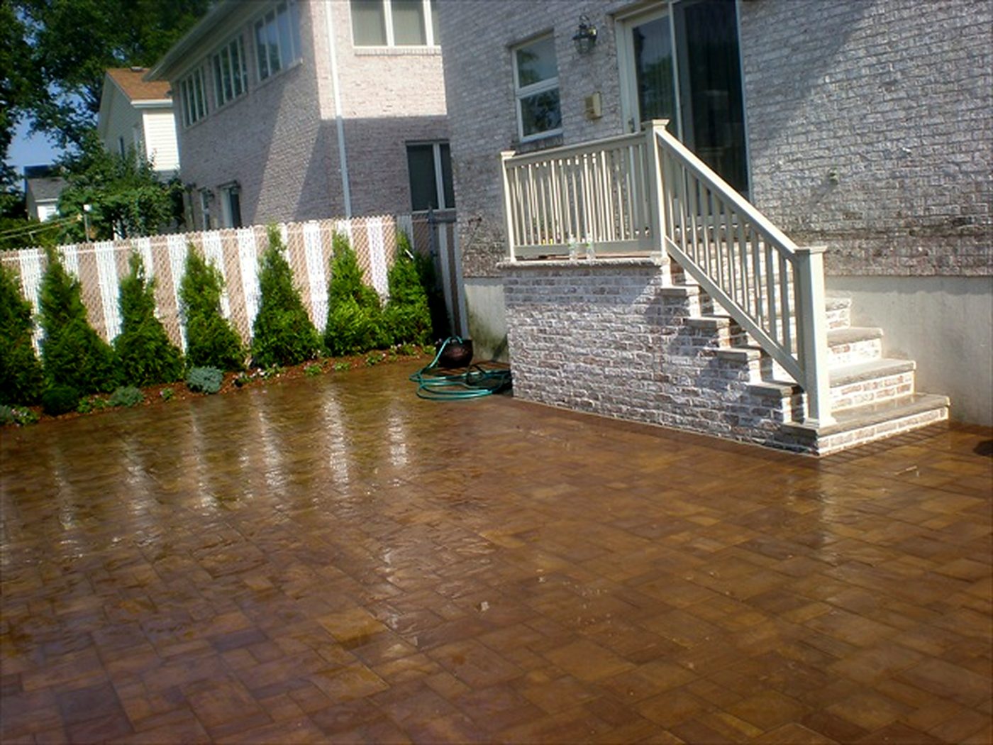A landscaped rear garden with paved terrace